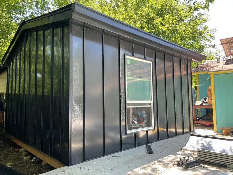 Black standing seam metal wall panels for Metal Roof Installation in Manchester-by-the-Sea